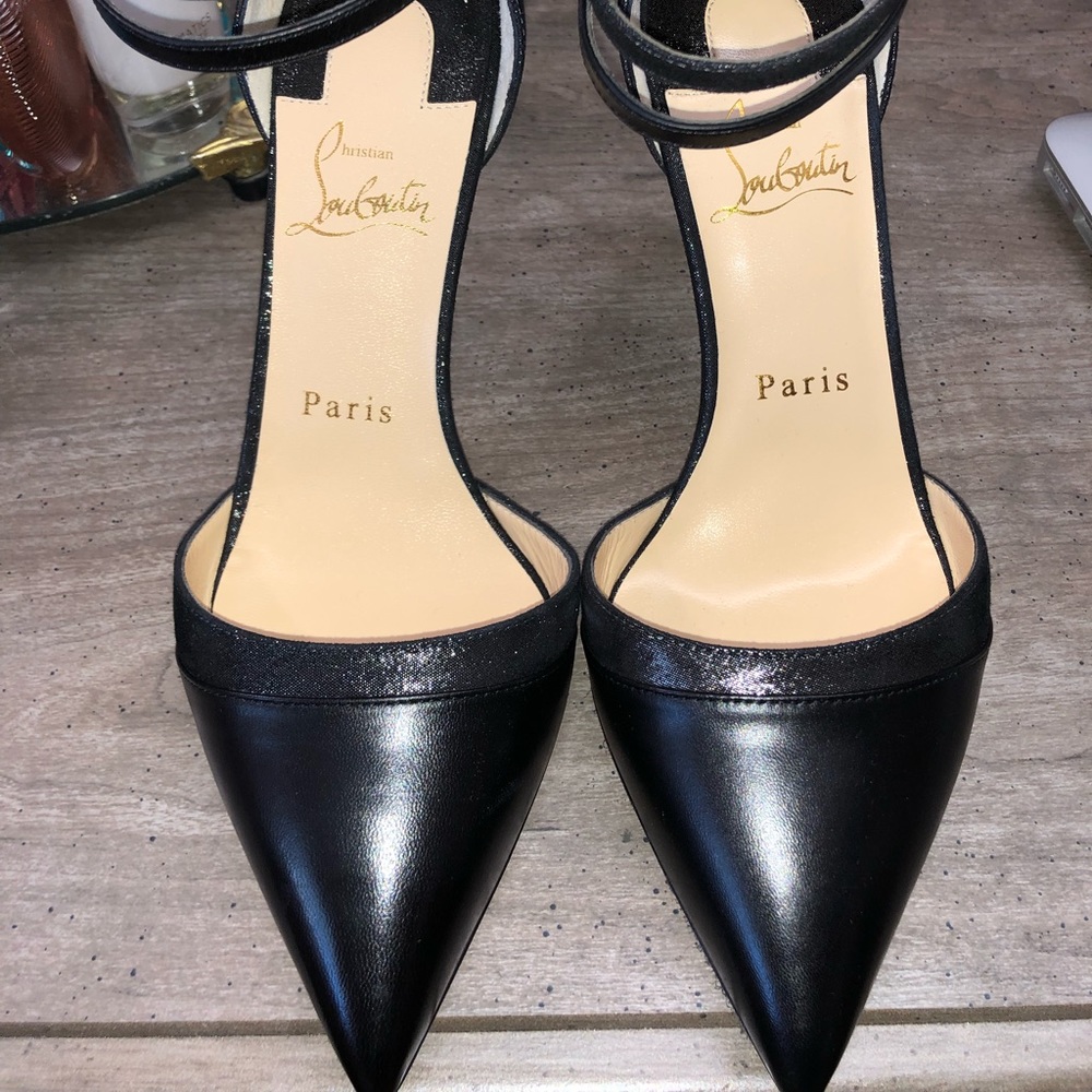 christian louboutin uptown double pumps in black.